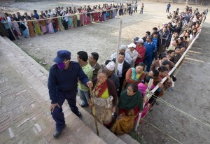 Nepalis queue up to vote at a polling station in the outskirts of Kathmandu